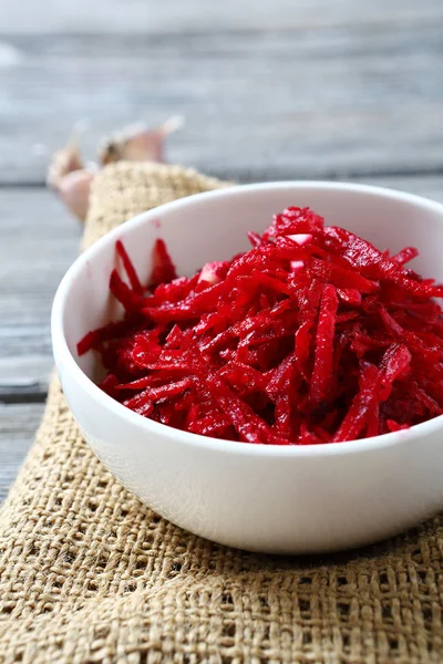 Grated beet in a bowl — Stock Photo, Image