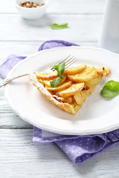 Slice of apple tarte with cinnamon, mint — Stock Photo, Image