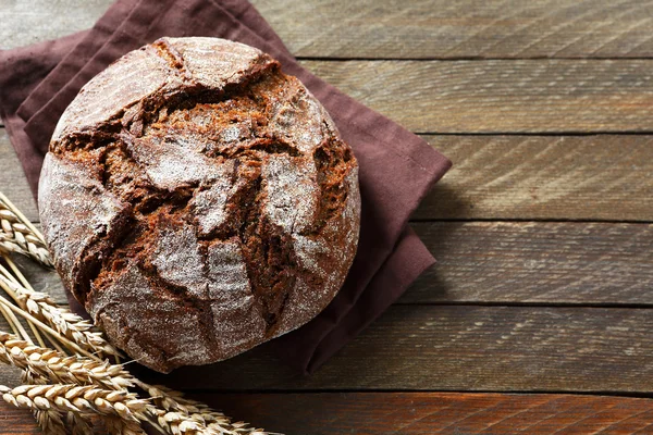 Black rye bread on a napkin — Stock Photo, Image