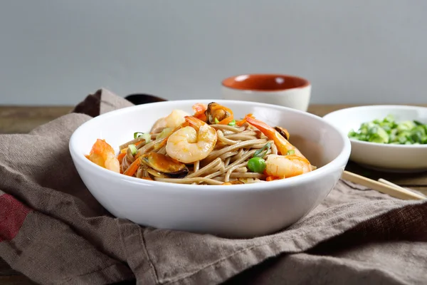 Noodles in a white bowl with shrimps — Stock Photo, Image