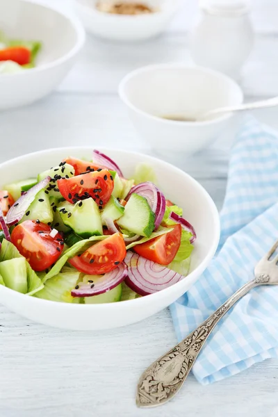 Salad with cucumbers and onions — Stock Photo, Image