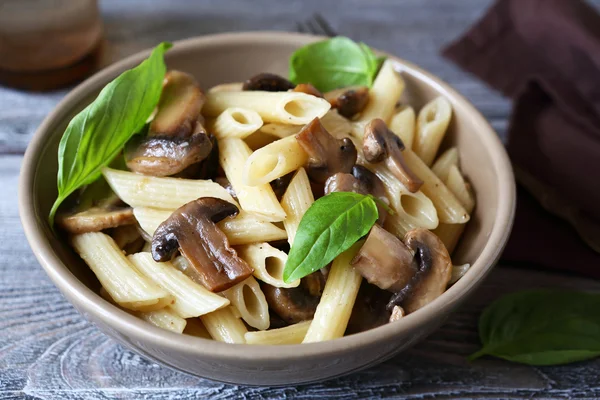 Pasta with mushrooms in a bowl — Stock Photo, Image