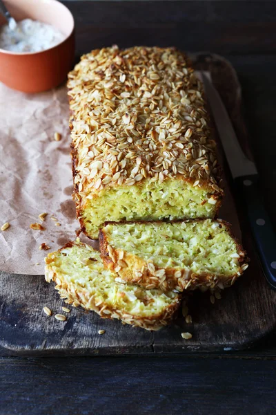 Zucchini loaf on rustic table — Stock Photo, Image