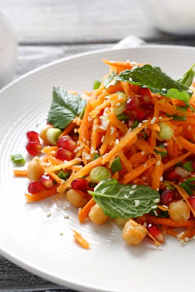 Salad with carrots and greens — Stock Photo, Image