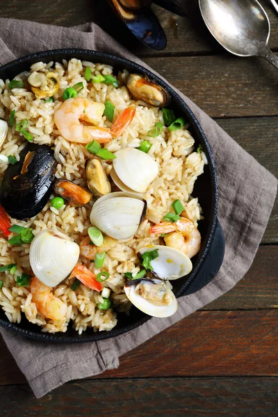 Paella with seafood and spices in pan — Stock Photo, Image