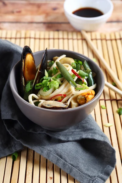 Tasty noodles with seafood — Stock Photo, Image