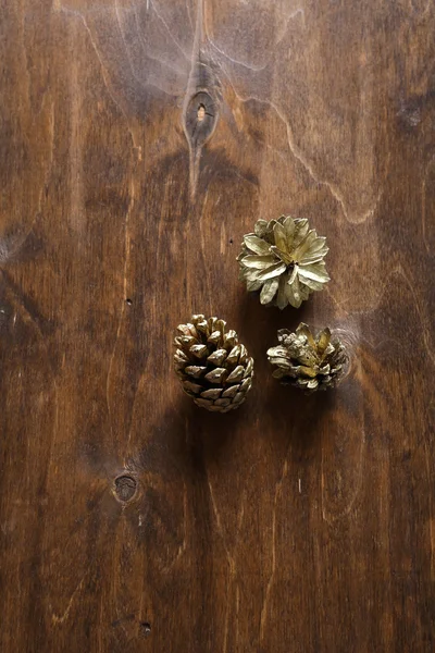 Cones on the plywood — Stock Photo, Image