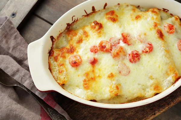 Baked lasagna in baking dish — Stock Photo, Image