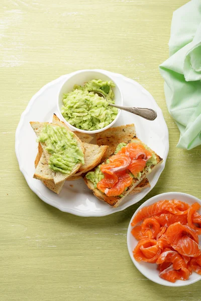 Canape with salmon and avocado — Stock Photo, Image