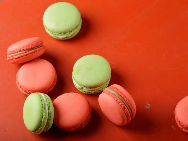 Frecnh macaroons on red background — Stock Photo, Image