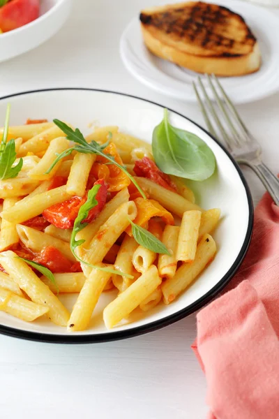 Pasta penne with cheese and tomato — Stock Photo, Image