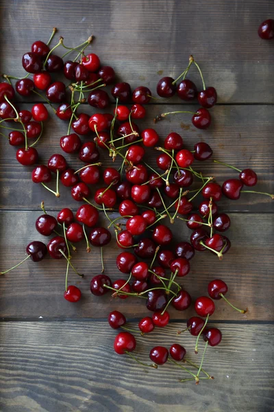 Ripe cherry on rustic boards — Stock Photo, Image