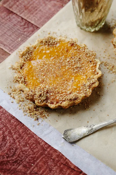 Small pumpkin pie with nuts — Stock Photo, Image