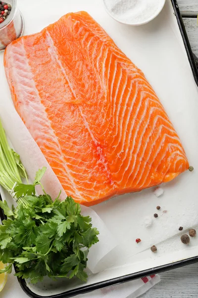 Trout fillet with spice on white tray — Stock Photo, Image