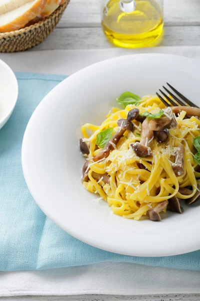 Pasta on white plate — Stock Photo, Image