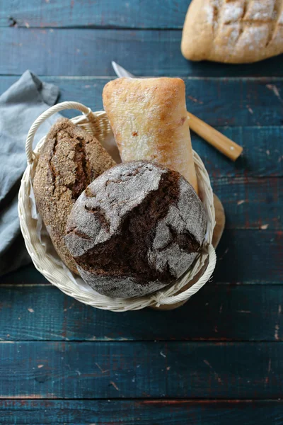 Three breads in basket — Stock Photo, Image