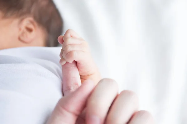 Baby hand — Stockfoto