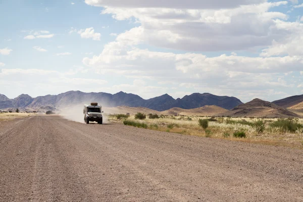 Driving in a dirt road — Stock Photo, Image