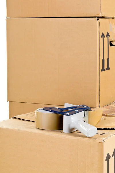 Pohyblivé karton krabice zásobník s pásky váleček — Stock fotografie