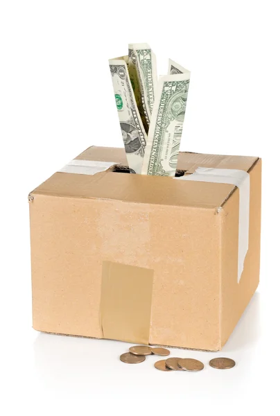 Donation cardboard box with dollar banknotes and coins — Stock Photo, Image