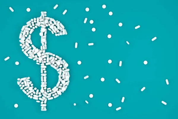 Dolar Znamení Bílými Pilulky Kapsle Přes Modré Pozadí Medicína Farmacie — Stock fotografie