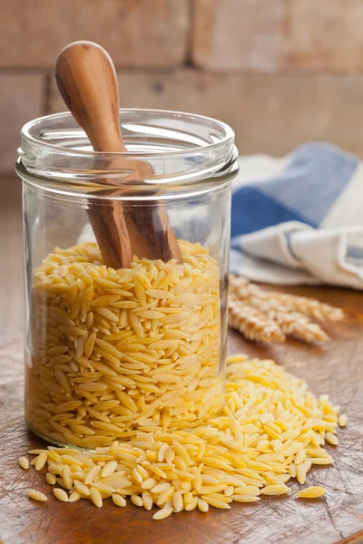 Raw durum wheat in kitchen — Stock Photo, Image