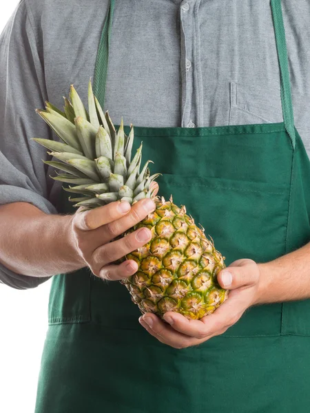 Farmer holding whole fresh pineapple fruit — Stock Photo, Image