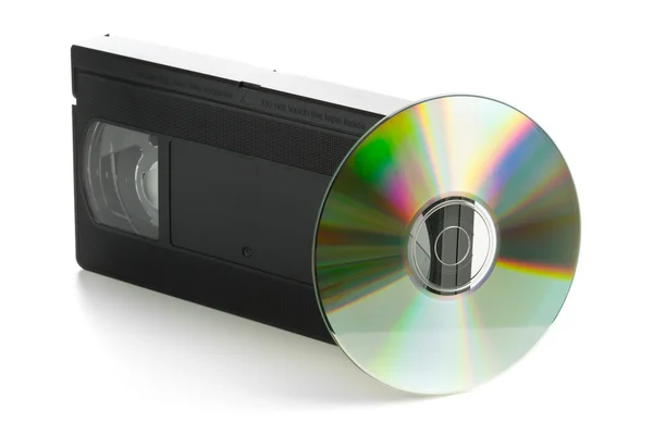 Analog video kaset ile Dvd yuvarlak yüzey — Stok fotoğraf