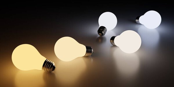 Light bulbs laying on the floor showing different color temperatures from warm orange to cool blue on dark background, 3D illustration