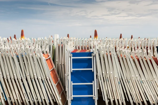 Umbrellas beach closed in a Italian beach — Stock Photo, Image