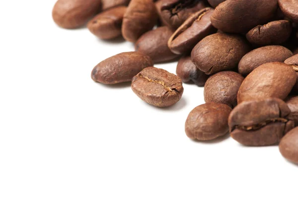 Corner decoration of coffee beans on white background — Stock Photo, Image