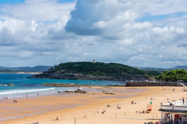 long view of Sardinero beach with bathers