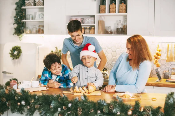 Three Teenage Boys Help Mother Cut Bread Christmas Dinner Preparing — Stock Photo, Image