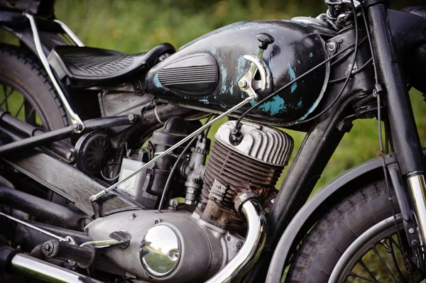 The historic motorcycle on the forest background — Stock Photo, Image