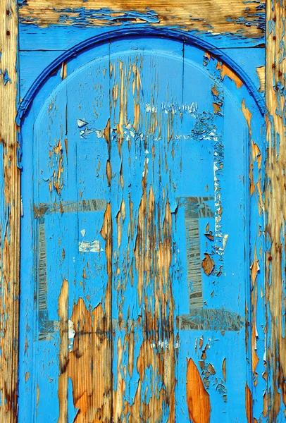 Old door painted with blue paint — Stock Photo, Image