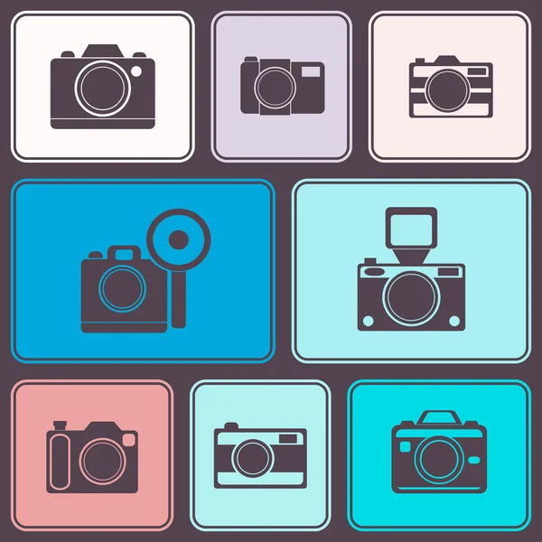 Seamless background with photo camera symbols — Stock Vector