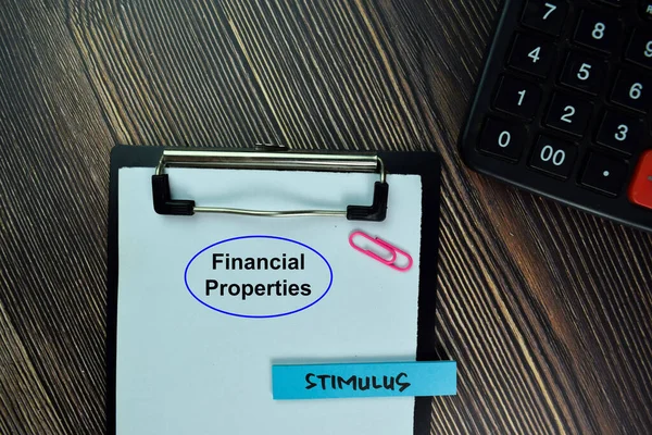Financial Properties Stimulus Write Sticky Note Isolated Wooden Table Finance — Stock Photo, Image