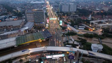 Traffic jam on the polluted streets of Bekasi. Has the highest number of motor vehicles and the traffic congestion is limited in few areas. Bekasi, Indonesia, May 22, 2021