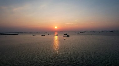 Aerial view of Beautiful sunset on the sea. Bekasi, May 22, 2021