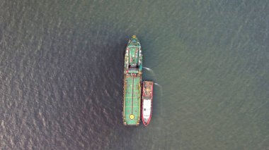 Aerial view on the sea and boat. Beautiful natural seascape at the summer time. Bekasi, May 22, 2021