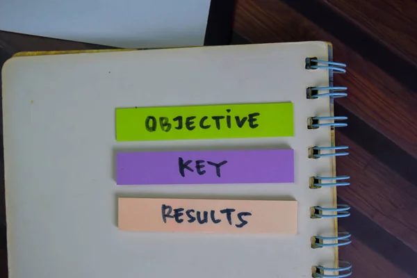Objective Key Results Write Sticky Notes Isolated Wooden Table — Foto Stock