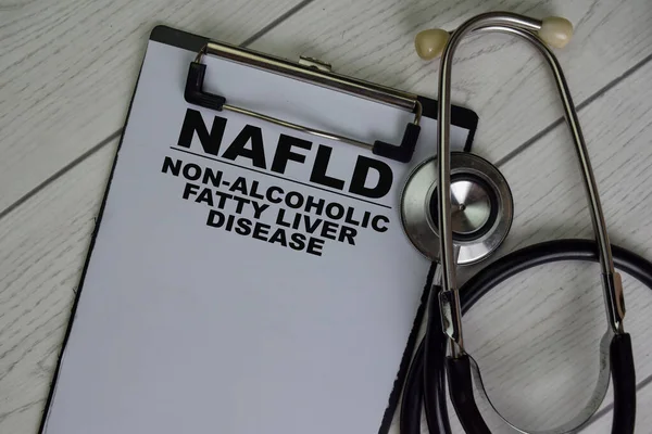 NAFLD - Non-Alcoholic Fatty Liver Disease write on a paperwork isolated on Wooden Table.