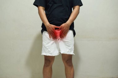 Prostatta erkek doğurganlık ağrısı. Prostat iltihabı ya da zührevi bir hastalıktan muzdarip bir adam. Sağlık sorunları kavramı