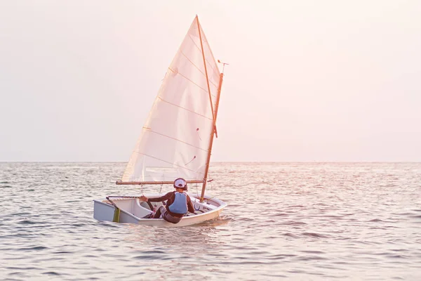 Handsome Young Boy Learning Sail Sailing Boat Sunset Ocean Outdoor Royalty Free Stock Images