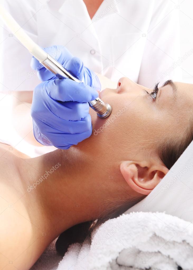 The woman at the beautician, microdermabrasion