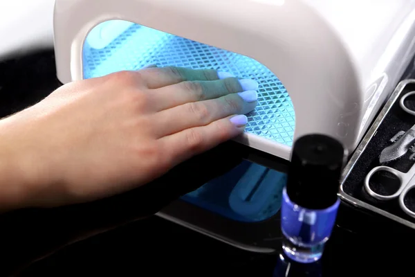 Hybrid manicure, uv lamp, nail plate curing — Stock Photo, Image