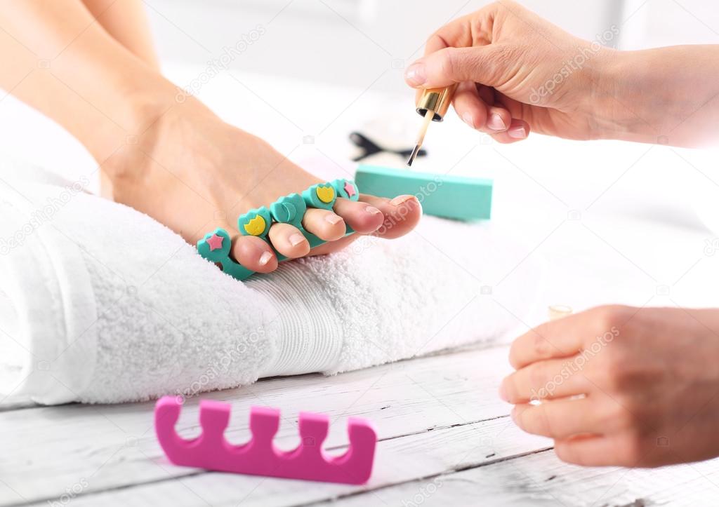 Nail clipping, cutting skins pedicure treatment — Stock Photo