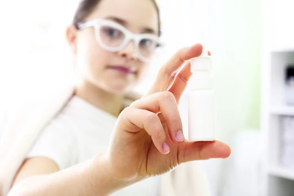 Sick girl dripping nose drops — Stock Photo, Image