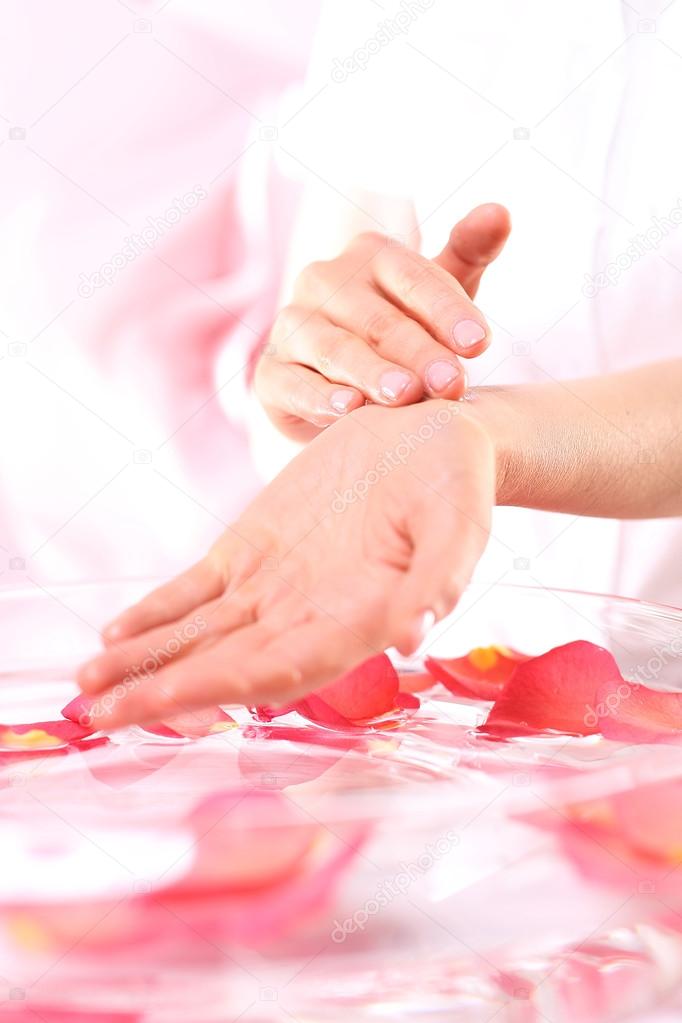 Hands women, rose bath nursing