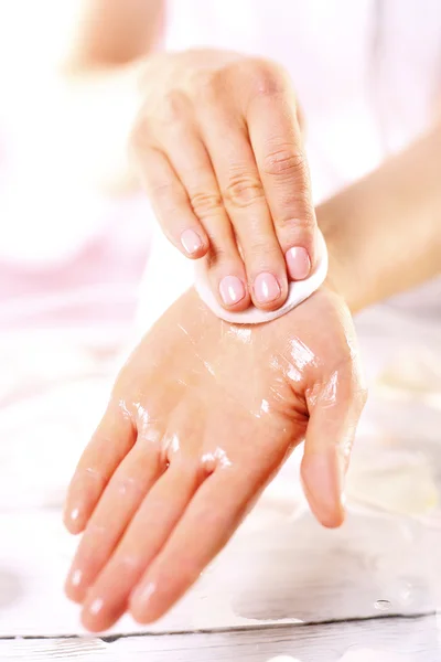 Hand massage with warm oil — Stock Photo, Image